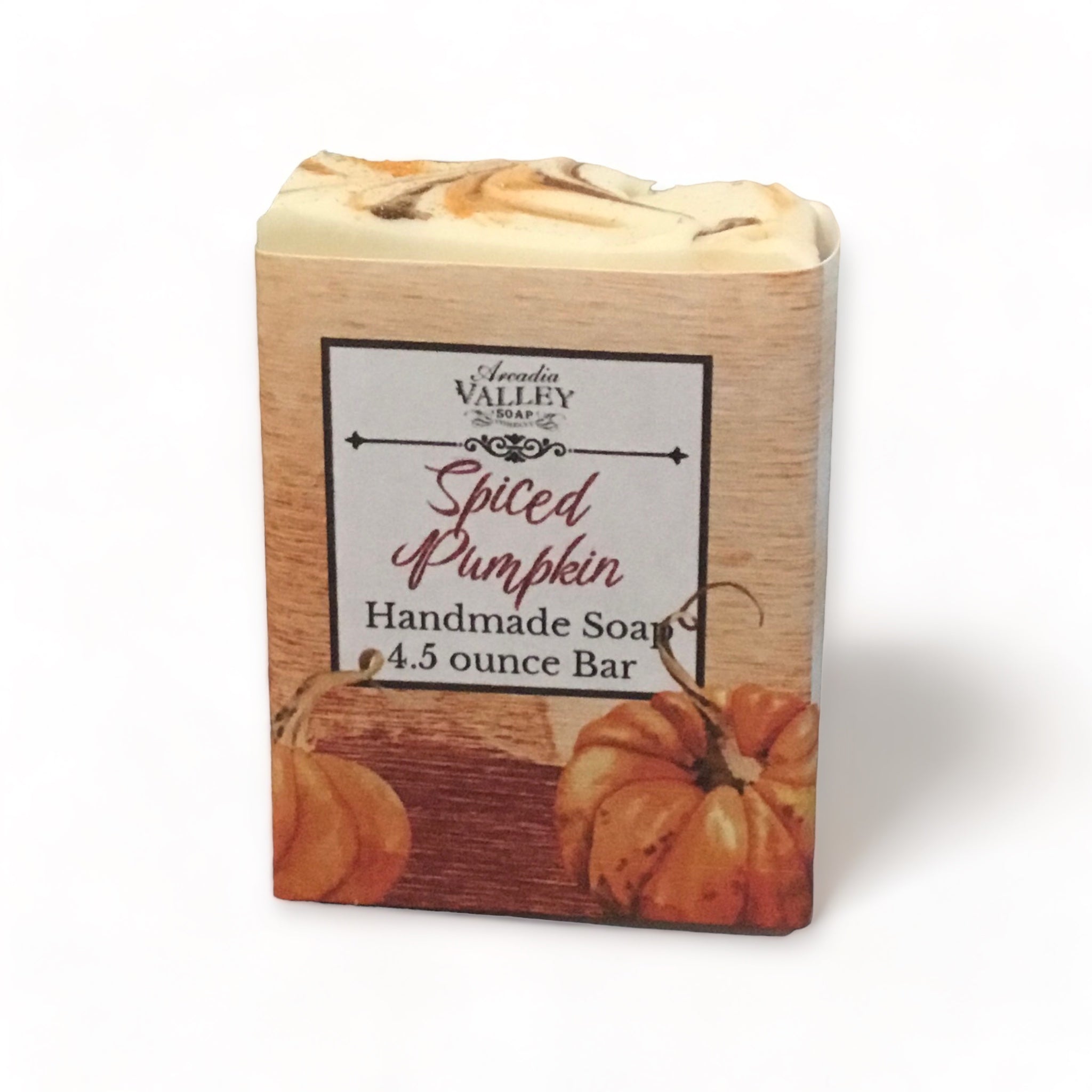 Spiced Pumpkin soap with decorative paper wrapper on a white background