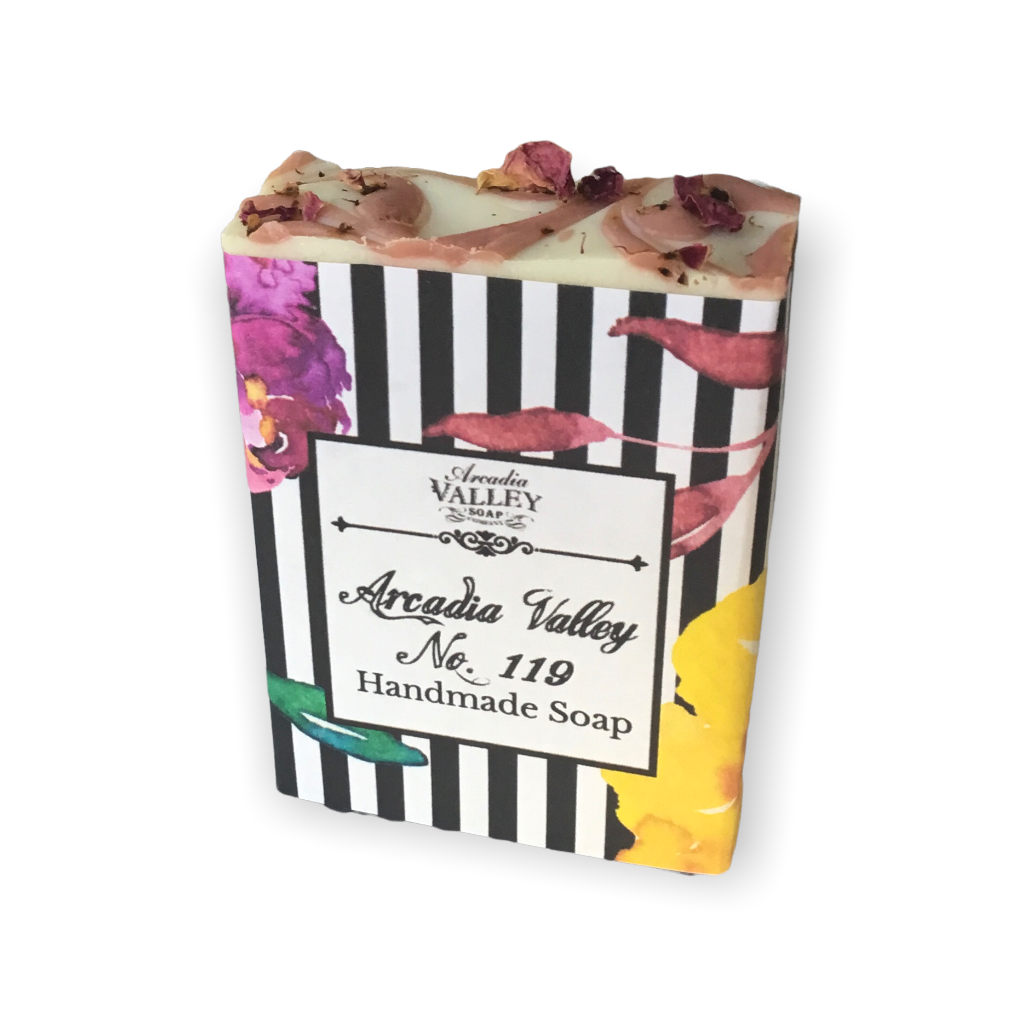 Arcadia Valley No19 Soap bar wrapped in black and white striped paper with dried rose petals on top of bar showing